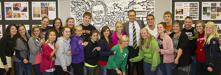 20121010_Gow_with_art_class_0011_HeW Joe Gow with class in front of artwork