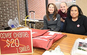 20121106_Morale_Retreat_LIVEMAROON_0032we Three in front of Morale Retreat sign.