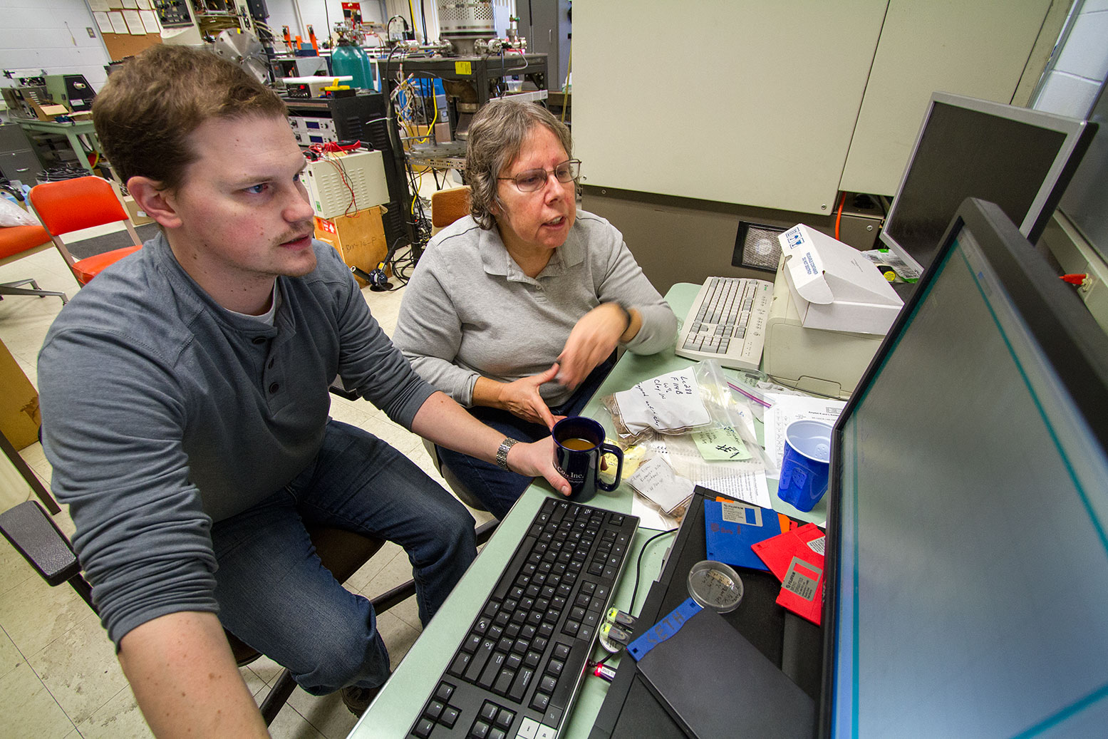 Seth King and MVAC person on computer. 