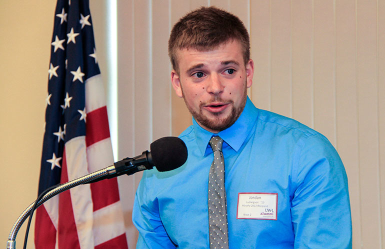 Student at podium. 