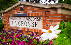 UW-L sign with flowers.