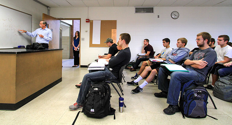 Wineland talking to class.