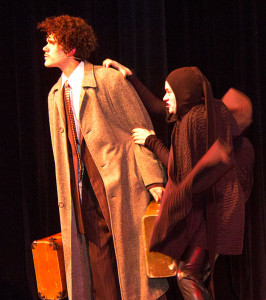 ustin Cooke, as Dr. Frederick Frankenstein, and Maxwell Ward, as the hump-backed Igor, pictured acting on the stage.