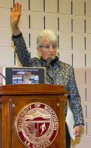 Carol Ebert at podium.