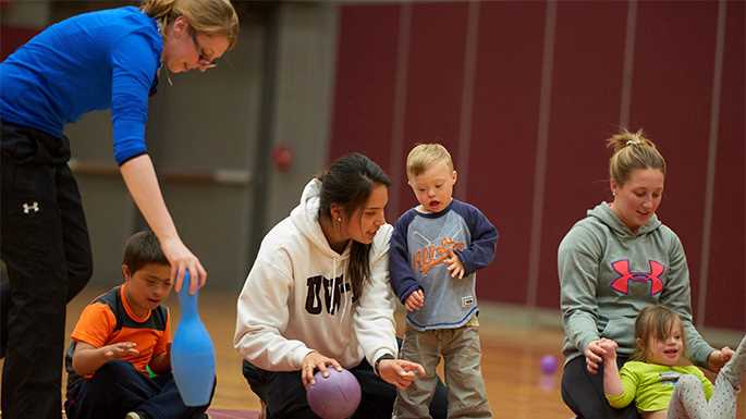 UW-La Crosse adapted physical education students assist children from the community during a class in Mitchell Hall.  UWL has received a $1.25 million competitive grant to continue its nationally recognized work preparing adapted physical education teachers for schools across the country.
Read more →
