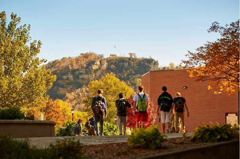 UWL students walk to Cartwright Center with Granddad bluff in the background.
Read more →
