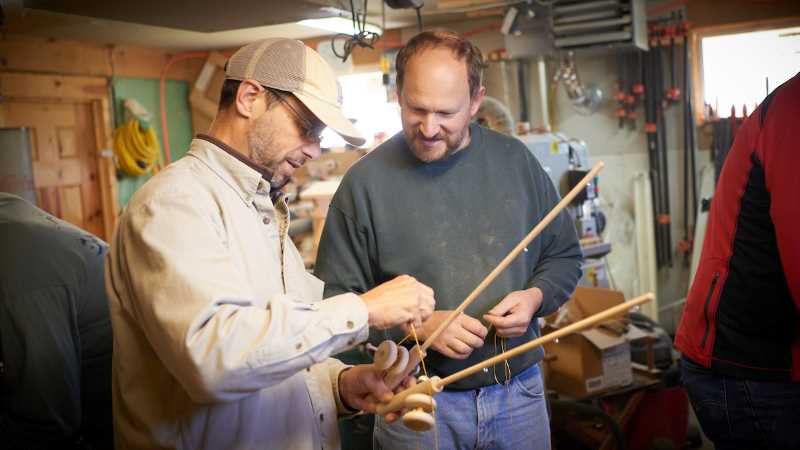From left, Scott Cooper, UWL biology professor and  director of Undergraduate Research and Creativity; and Kurt Grunwald, laboratory manager in Biology. The two are pictured working on wooden fishing poles in 2016.
Read more →

