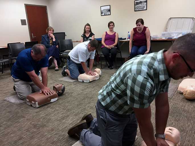 University staff members practice chest compressions as part of their CPR and AED training in July.
Read more →
