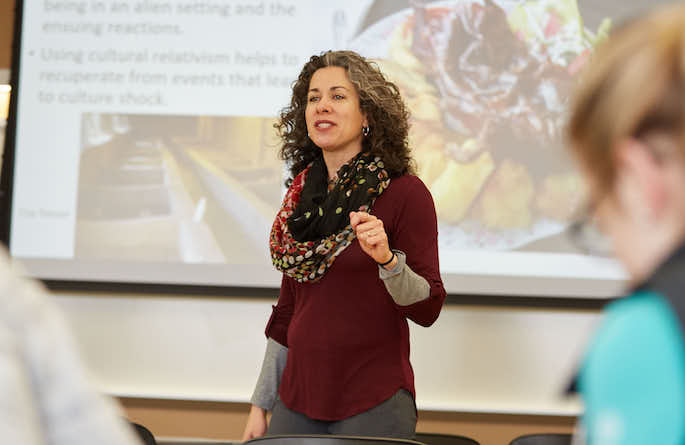 Image of Christine Hippert lecturing.