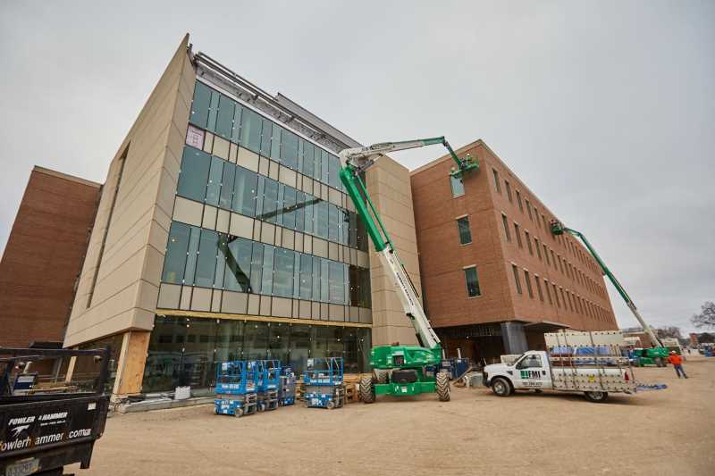 A view of the north-facing entrance of the Science Labs Building. The construction is expected to wrap up by the fall of 2018.
Read more →