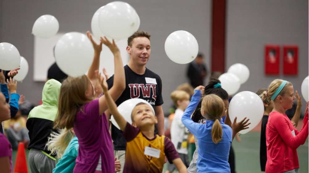 UW-La Crosse physical education teacher education majors are creating lesson plans and learning opportunities for area home-schooled, K-12 students. While the college students learn to plan and implement lessons, the children are learning skills to live healthy, active lifestyles. The class-community arrangement may not be new to physical education teaching programs nationwide, but it may be one of the most popular. “I’ve met and talked with other faculty from around the country and this is one of the largest programs — and we are only in the first semester,” says UWL’s Physical Education Teaching Program Director Deb Sazama.
Read more →