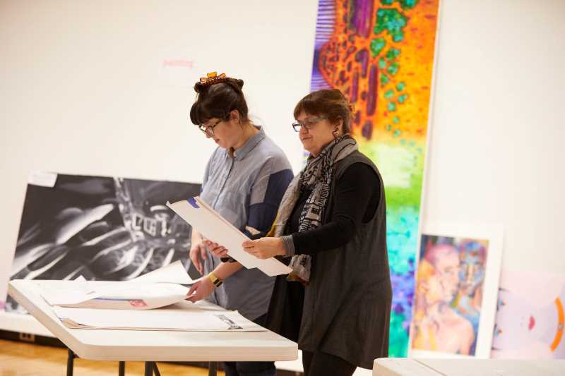 Jurors for the UW-La Crosse All-Student Juried Exhibition, Winona State University faculty members Instructor Alessandra Sulpy, left, and Professor Anne Scott Plummer, review work submitted for the show that runs Feb. 23-March 8.
Read more →
