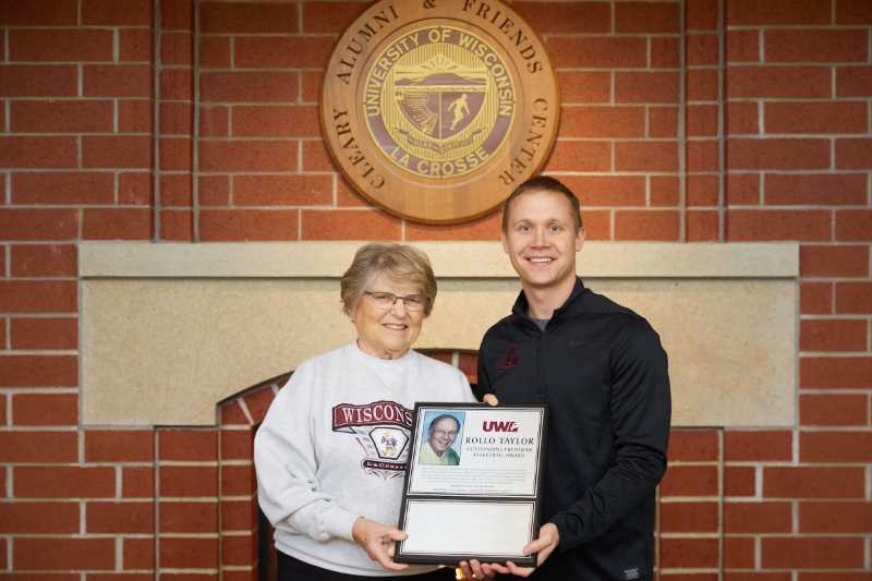 Kay Taylor, Rollo’s wife presented UWL Men’s Basketball Coach Kent Dernbach with a plaque that will list freshman award recipients. 
Read more →
