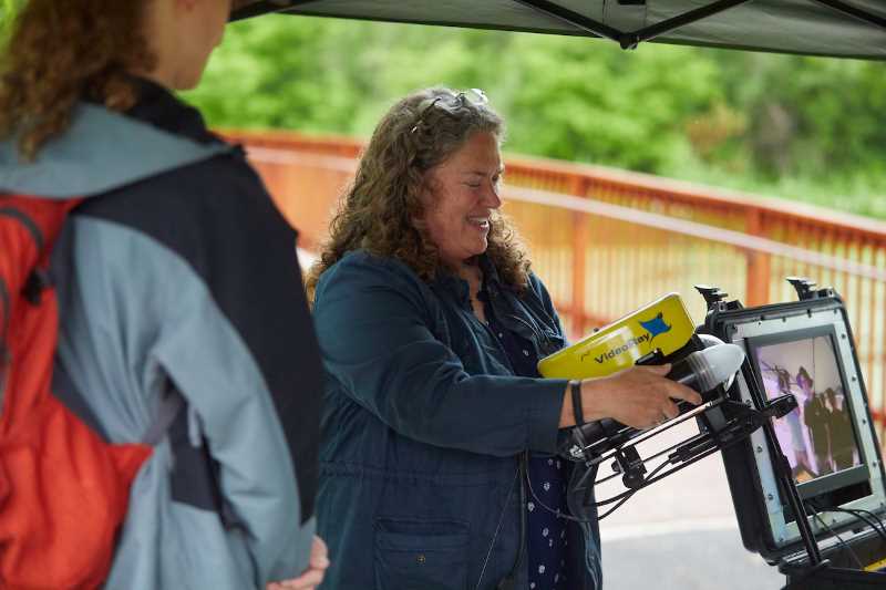 UWL’s Laurie Harmon shows off the live-camera function on a remotely operated vehicle, also known as an ROV, to a group of high school students at Chad Erickson Memorial Park in La Crosse.
Read more →
