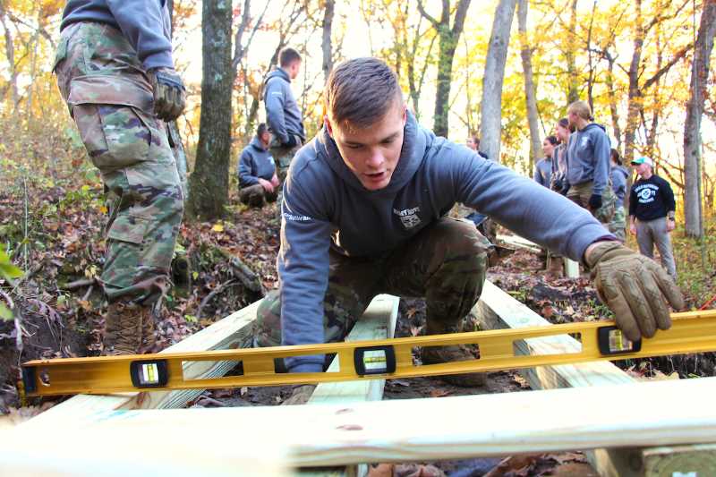 UW-La Crosse ROTC students replaced an aging bridge on Oak Trail in La Crosse’s Hixon Forest in October. An increased amount of rain running off of Bliss Road over the course of several years has created deeper ravines and the need for bigger and better bridges in Hixon Forest. Volunteer service is among the many activities that helps UWL rank as a Military Friendly School.
Read more &rarr;
