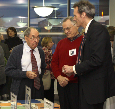 Authors talking with Joe Gow. 