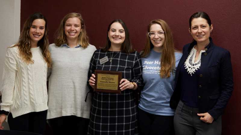 Cassandra Worner, UWL wellness coordinator, has received the State’s Student Supervisor of the Year Award. Here she receives UWL’s award. From left, Shelbey Hagen, undergraduate peer health advocate and nominator; Margaret Rynkiewicz, undergraduate peer health advocate and nominator; Cassandra Worner, UWL interim wellness coordinator; Lilli Minor, undergraduate peer health advocate and nominator; and Alexandra Larsen wellness graduate assistant. 
Read more →
