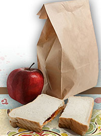 Brown bag lunch, apple and sandwich.