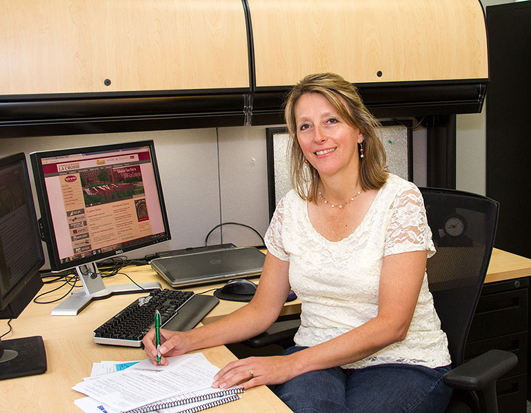 Carla_Burkhardt__2012_0003wes Carla Burkhardt at her desk.