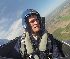 UW-L Chancellor Joe Gow pictured in a Blue Angels jet.