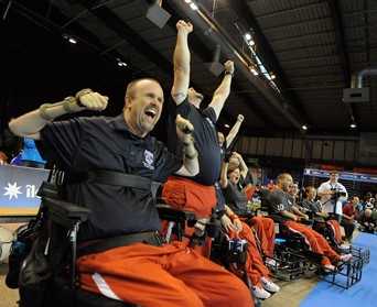 Photo © Scot Goodman. Coach Chris Finn throws his hands up in the air as the final whistle blew in a victory against England in the 2011 World Cup.
Read more →
