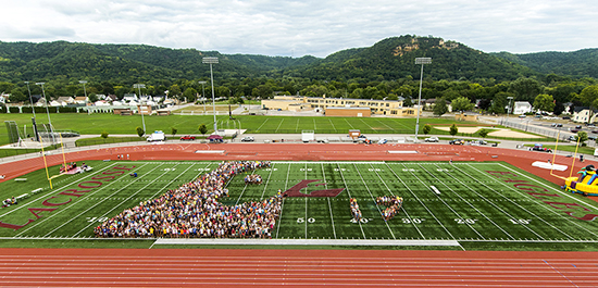 UW-L class of 2017 form an eagle L on the football field. 