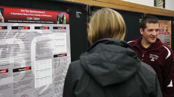 UWL Senior Collin Talbert discusses his research, “Are You Sportscentered? A Quantitative Study of Fan’s Likability of ESPN Anchors” with guests at the department’s poster presentation.
Read more →
