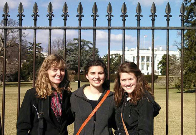 Group in front of White House.