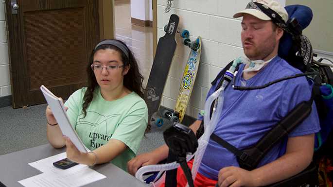 Over the summer, UWL Senior Nick Dobbs was a geometry and statistics tutor for Upward Bound, a program that prepares high school students for college. Here he tutors Destini Robinette, an Upward Bound participant from Tomah High School.  Before his accident, Dobbs had considered teaching as he enjoys working with kids. 
Read more →
