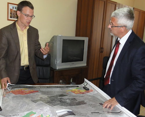 DSC00385 Ryan Perroy presents a map of soil contamination that he created to the Albanian Deputy Minister of the Environment.