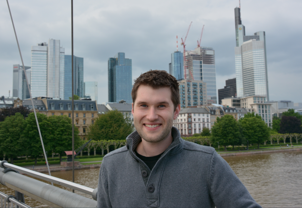 Eric Rude pictured in front of German city.