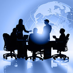 Business people with globe artwork. 