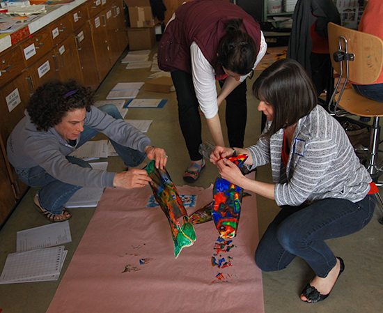 People working on an art project.