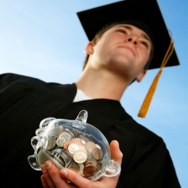 Image of graduate holding jar of money.