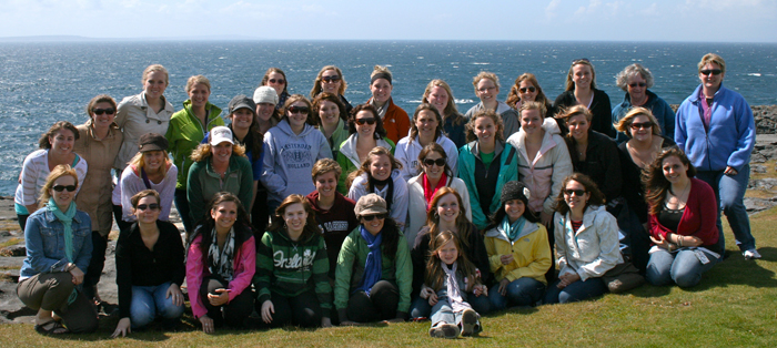 Group in front of ocean. 