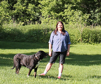 Associate Professor Jo Arney pictured at her Coon Valley farm with her dog. 