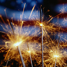Sparklers with U.S. flag.