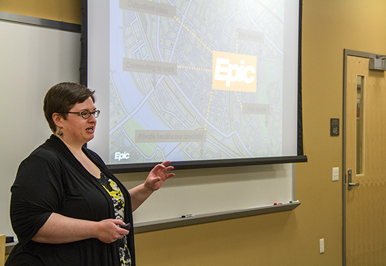 Image of Kaitlindh Moubry, a technical writer for Epic, talks to English Professor Marie Moeller’s technical writing class. 