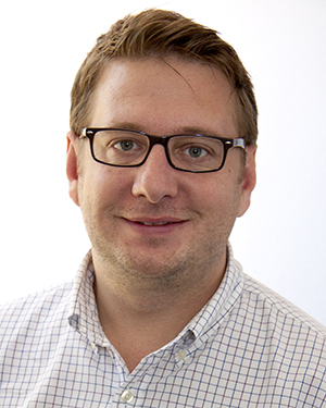 headshot image of John Kovari