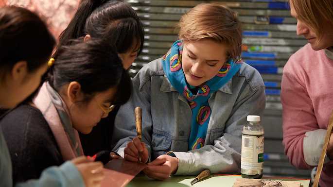 UWL printmaking students Molly Korinek and Mark Lee describe printmaking techniques to middle school students from Luoyang, China. Korinek and Lee made example prints and helped the students create their own prints on T-shirts during a language and cultural immersion program at UWL in February. 
Read more &rarr;
