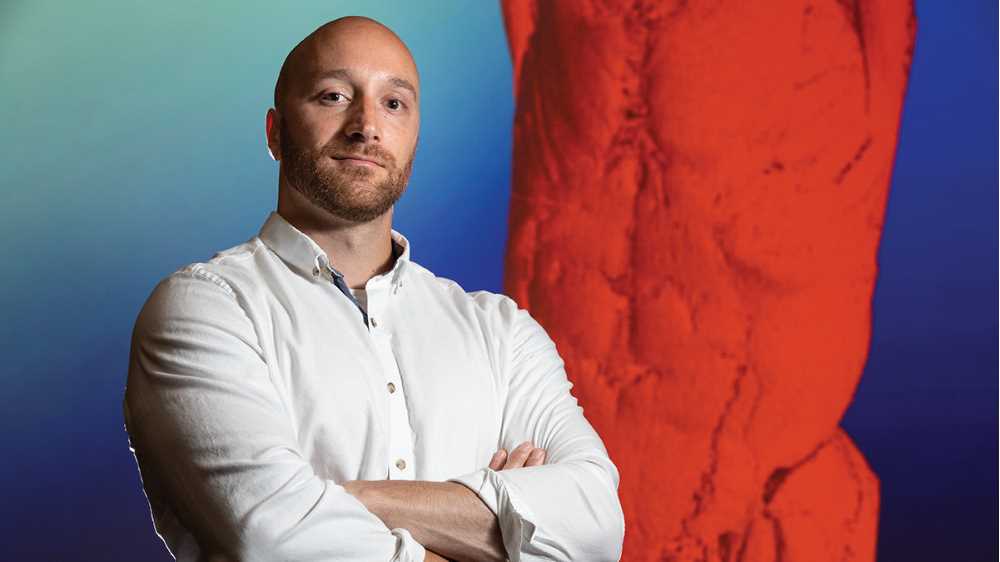 Adam Kuchnia stands in front of a projected 3D image of human torso muscles created from dozens of cross-sectional CT scans. Photo by Michael P. King
Read more →
