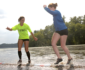 Katie Rick pictured log rolling.