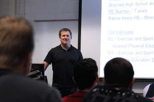 Mike Doyle speaks to a UW-L class about his experience teaching adapted physical education.