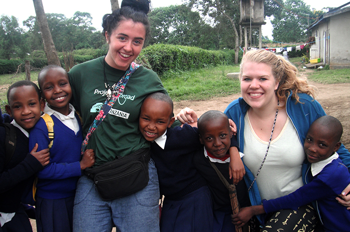 Anna Monson pictured with students at school.