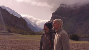 Mishra and Radenz look out to the mountains of Nepal