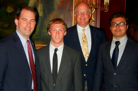 Image of  Gov. Scott Walker, UW-L student Nick Gorman, Sen. Dale Schultz, and Gorman’s colleague Sanchit Mulmuley.