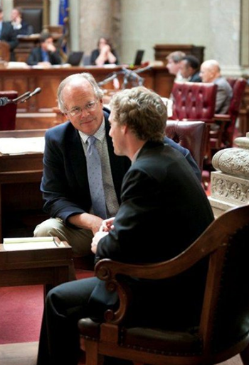 Image of Nick Gorman and Sen. Dale Schultz on the Senate floor during a session in July 2012.