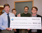 Rep. Ron Kind and UW-L Associate Professor Aric Opdahl holding check. Rep. Ron Kind and UW-L Associate Professor Aric Opdahl holding check.