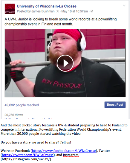 Student holding a weight behind his head as he does a squat. 