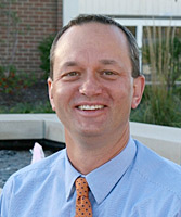 Headshot of Greg Reichert.